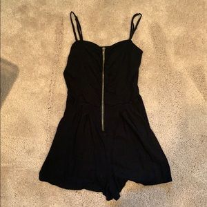 Black spaghetti strap romper with golden zipper